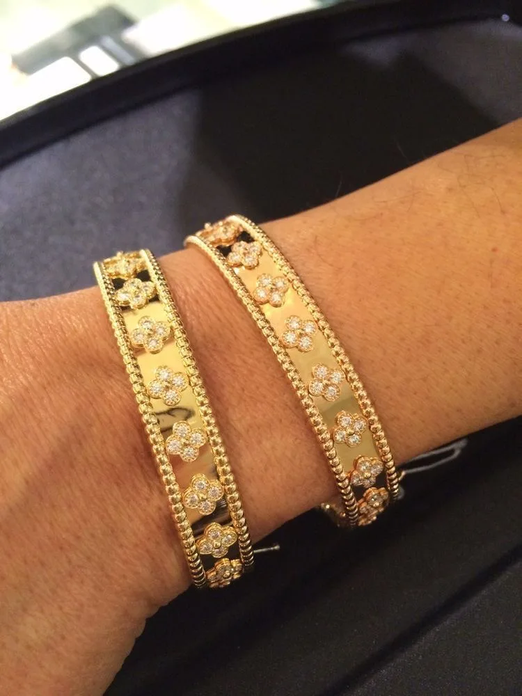 Lindsay Floral Bangle worn in gold and rose gold